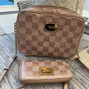 Michael Kors medium crossbody bag with matching wallet.